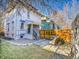 Backyard with patio, landscaping, and view of house exterior at 1448 N Williams St, Denver, CO 80218