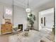 Elegant living room with fireplace, decorative tile, and large windows at 1448 N Williams St, Denver, CO 80218