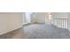 Spacious bonus room with gray carpeting and built-in window seat at 2332 W Baltic Pl, Englewood, CO 80110