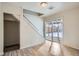 Bright dining room with sliding glass door to backyard at 2332 W Baltic Pl, Englewood, CO 80110
