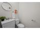 Clean and modern bathroom with white vanity and marble countertop at 8447 W Dakota Ave # B, Lakewood, CO 80226