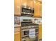 Stainless steel microwave and gas range at 7306 S Nucla St, Aurora, CO 80016