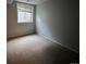 Spacious basement bedroom with carpet and window at 16433 E Girard Ave, Aurora, CO 80013