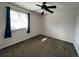 Bright bedroom with ceiling fan and window coverings at 16433 E Girard Ave, Aurora, CO 80013