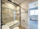 Bathroom with a shower/tub combo and view to bedroom at 2171 Peralta Loop, Castle Rock, CO 80104