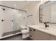 Stylish bathroom with white wave patterned shower and gray floor at 9737 Majestic Oak Dr, Parker, CO 80134