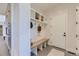 Charming mudroom with built-in bench and storage at 9737 Majestic Oak Dr, Parker, CO 80134