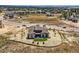 Aerial view of house and surrounding area, showcasing the property's landscaping and neighborhood at 9737 Majestic Oak Dr, Parker, CO 80134