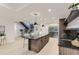 Modern basement bar with wine storage, an island, and sleek cabinetry at 9737 Majestic Oak Dr, Parker, CO 80134