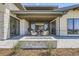 Stone patio with fire pit and seating area at 9737 Majestic Oak Dr, Parker, CO 80134