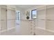 Spacious walk-in closet with custom built-ins and island at 9737 Majestic Oak Dr, Parker, CO 80134