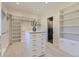 Large walk-in closet with ample shelving and drawers at 9737 Majestic Oak Dr, Parker, CO 80134