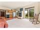 Cozy basement kitchenette with wood cabinets and a convenient breakfast bar at 8 Yuma Trl, Evergreen, CO 80439