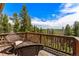 Deck offering expansive mountain views at 8 Yuma Trl, Evergreen, CO 80439