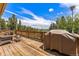 Deck with mountain views, grill and outdoor furniture at 8 Yuma Trl, Evergreen, CO 80439