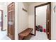 Inviting entryway with a built-in bench and coat hooks at 8 Yuma Trl, Evergreen, CO 80439