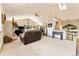 Open living room with high ceilings and lots of natural light at 8 Yuma Trl, Evergreen, CO 80439