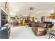 Open concept living room, kitchen and dining area at 8 Yuma Trl, Evergreen, CO 80439