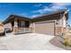 Two-story home with a two-car garage and front porch at 521 Felicity Loop, Castle Rock, CO 80109