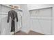 Walk-in closet with ample storage space, shelving, and hanging rods at 16514 W 93Rd Way, Arvada, CO 80007