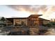 Exterior of the community center with outdoor seating, and modern design at 16514 W 93Rd Way, Arvada, CO 80007