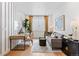 Cozy home office space with a comfortable couch, desk, and ample natural light at 16514 W 93Rd Way, Arvada, CO 80007