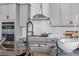 Close-up of kitchen counter with stainless steel appliances and a modern black faucet at 16514 W 93Rd Way, Arvada, CO 80007