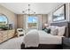 Relaxing main bedroom with a comfortable bed and large window at 16514 W 93Rd Way, Arvada, CO 80007