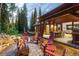 Cozy patio with fire pit and outdoor dining area at 1003 Boreas Pass Rd, Breckenridge, CO 80424