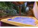 Relax in this outdoor hot tub with mountain views at 1003 Boreas Pass Rd, Breckenridge, CO 80424
