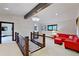 Open landing with a view to the living room at 1003 Boreas Pass Rd, Breckenridge, CO 80424