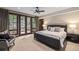 Spacious bedroom with large windows and patio access at 1003 Boreas Pass Rd, Breckenridge, CO 80424