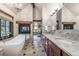 Bathroom with freestanding tub and double vanity at 1003 Boreas Pass Rd, Breckenridge, CO 80424