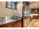 Kitchen features a farmhouse sink and stainless steel countertops at 1003 Boreas Pass Rd, Breckenridge, CO 80424