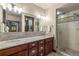 Double vanity bathroom with granite countertop and walk-in shower at 1003 Boreas Pass Rd, Breckenridge, CO 80424