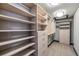 Large walk-in closet with ample shelving at 1003 Boreas Pass Rd, Breckenridge, CO 80424