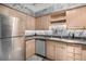 Modern kitchen with stainless steel appliances and granite countertops at 1020 15Th St # 28H, Denver, CO 80202