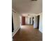 Bright living room featuring hardwood floors and access to the front door at 2080 Emporia St, Aurora, CO 80010