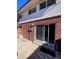 Rear exterior view, showing sliding glass doors to the patio at 8031 Wolff St # H, Westminster, CO 80031