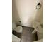 Small bathroom with pedestal sink, toilet and light grey vinyl flooring at 8031 Wolff St # H, Westminster, CO 80031