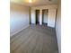 Large bedroom with double closets and neutral wall color at 8031 Wolff St # H, Westminster, CO 80031