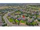 An aerial shot highlighting a house with a large backyard in a neighborhood at 4864 Harness Ct, Parker, CO 80134