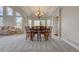 Dining area with a chandelier and large windows at 4864 Harness Ct, Parker, CO 80134