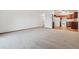 Large living room with carpeted floors and an open concept floor plan at 610 S Alton Way # 8D, Denver, CO 80247