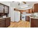 Bright kitchen with granite countertops and wood cabinets at 610 S Alton Way # 8D, Denver, CO 80247