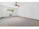 Bright and airy bedroom with carpeted floors and a window at 610 S Alton Way # 8D, Denver, CO 80247