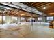 Unfinished basement with exposed beams and plenty of space at 6297 Ellingwood Point Way, Castle Rock, CO 80108