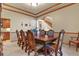 Formal dining room with a view to the staircase and hardwood floors at 6297 Ellingwood Point Way, Castle Rock, CO 80108