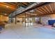 Unfinished basement with exposed beams and plenty of space at 6297 Ellingwood Point Way, Castle Rock, CO 80108