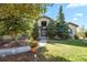 Two story house exterior with landscaping and walkway at 6297 Ellingwood Point Way, Castle Rock, CO 80108